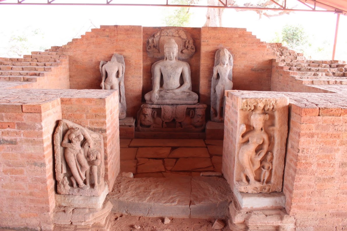 Buddha on one end of the aisle.